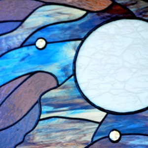 closeup of textures in large tiffany stained glass panel