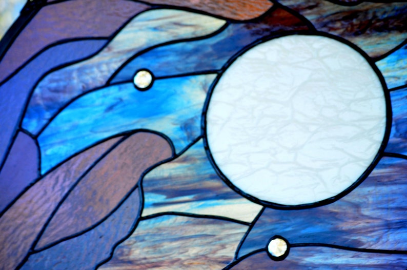 closeup of textures in large tiffany stained glass panel