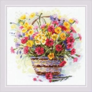 May include: A cross-stitch embroidery pattern featuring a woven basket filled with a vibrant bouquet of yellow, pink, red, and purple flowers. The design includes a handle on the basket and several loose flower petals scattered at the base.