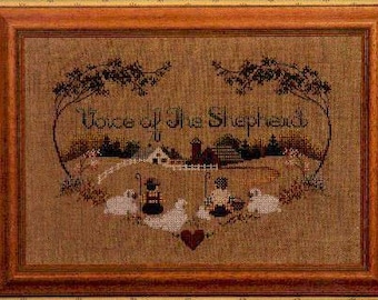 May include: Cross-stitch pattern featuring a heart-shaped design with a farmhouse scene and the text "Voice of the Shepherd".