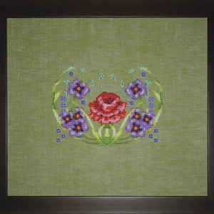 May include: A cross-stitch embroidery design featuring a red rose surrounded by purple flowers and green leaves on a green background.