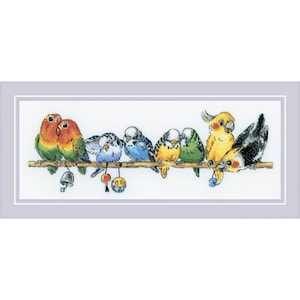 May include: A cross-stitch design featuring a collection of colorful birds perched on a branch. The birds include lovebirds, parakeets, and a cockatiel, with various colors like green, orange, blue, and yellow. Decorative elements like bells and ornaments are also present.