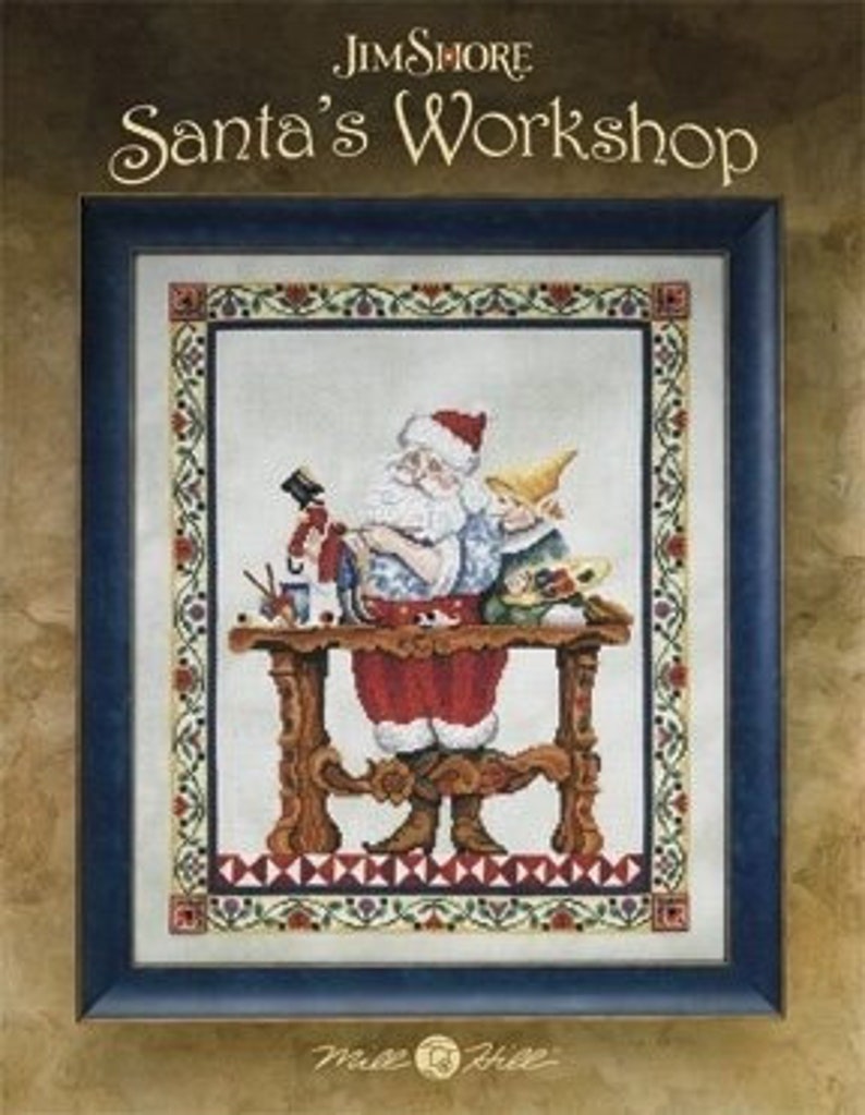 May include: Cross-stitch of Santa Claus and an elf at a workshop table. Santa, in a red suit and white beard, works on a toy soldier. The table is brown, and the background is a framed design with the text "Jim Shore Santa's Workshop".