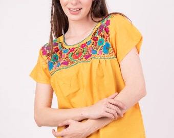 yellow top with flowers