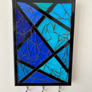 Mosaic wall hanging with 3 hooks for keys or jewelry.