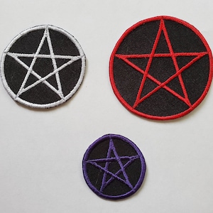 May include: Three circular patches with a black background and a pentagram design. One patch has a white pentagram, another has a red pentagram, and the third has a purple pentagram. The patches are embroidered.