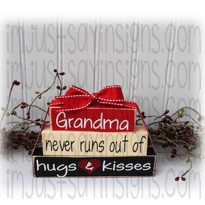 Grandma Never Runs Out Of Hugs and Kisses Itty Bitty Wood Stacker Blocks