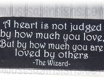 A Heart Is Not Judged By How Much You Love Sign, Wizard of Oz Sign, Wizard Quote, Oz Movie Quote, Wall Sign, Loved Sign,