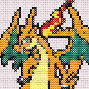 May include: Cross-stitch of a Charizard, a fictional fire and dragon-type Pokémon. The artwork features a pixelated design with orange, green, yellow, red, and black thread on a white background. The image is a close-up of the character.