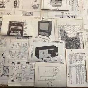 May include: A collection of vintage technical service manuals and schematic diagrams for electronic equipment, featuring black and white illustrations of radios, televisions, and internal circuitry with labeled parts lists and technical specifications.