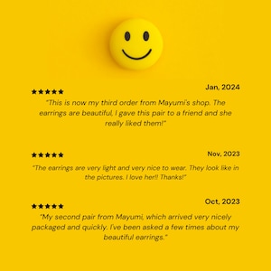 May include: Five-star reviews for earrings. The reviews highlight the earrings' beauty, lightness, and resemblance to the product photos. The reviews are dated January 2024, November 2023, and October 2023.
