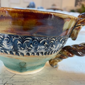 Ceramic pottery handmade mug with braided handle