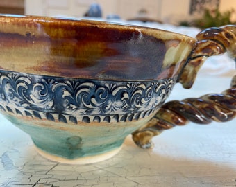 Ceramic pottery handmade mug with braided handle