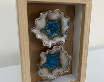 Handmade pottery wall art white and blue flowers