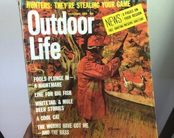 May include: A vintage magazine cover for Outdoor Life magazine, featuring a hunter in red clothing with a rifle, and the text "Hunters: They're Stealing Your Game" and "Outdoor Life" in large, bold letters.