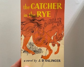 Small Paperback The Catcher in the Rye Paperback Novel by J.D. Salinger, J. D. Salinger's Catcher in the Rye Small Paperback Book
