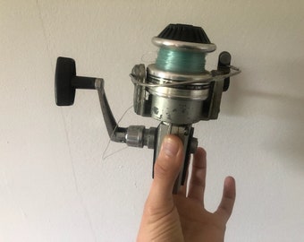 Moulinet de pêche vintage argent ZEBCO Spinner modèle 33