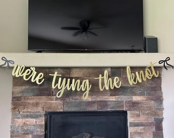 We’re tying the knot banner, bridal shower banner, bow banner, wedding shower decorations, engagement party decor