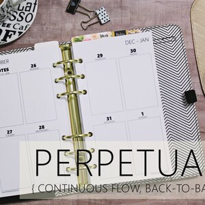 May include: A black and white planner with gold rings. The planner has a perpetual calendar layout with the months December and January displayed. The text "PERPETUAL { CONTINUOUS FLOW, BACK-TO-BACK }" is printed on the bottom of the planner.