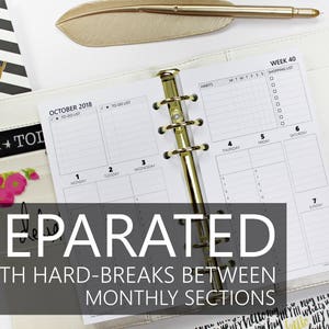 May include: A white planner with gold rings, a black and white striped cover, and a calendar section for October 2018. The planner has a weekly section with a to-do list and a shopping list. The text "SEPARATED WITH HARD-BREAKS BETWEEN MONTHLY SECTIONS" is printed on the planner.