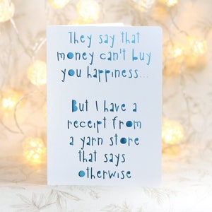They say that money can't buy you happiness, but I have a receipt from a yarn store that says otherwise, a paper cut card for knitters