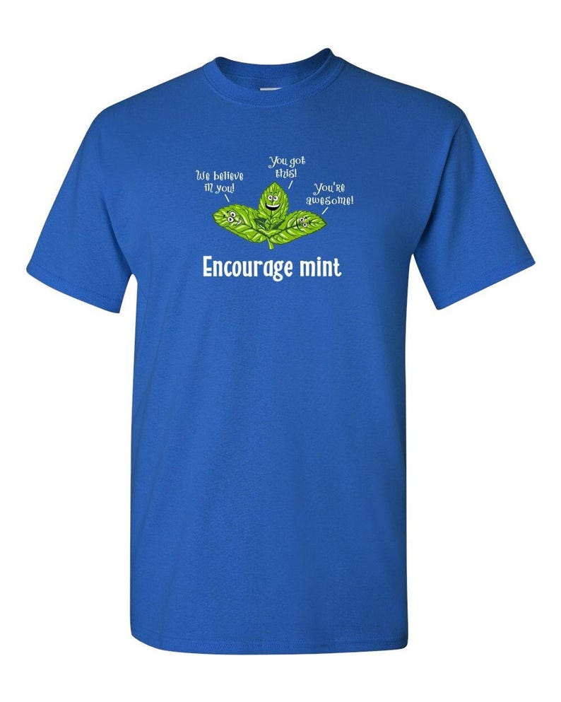 A bright royal blue t-shirt displaying an illustration of smiling mint leaves and the text Encourage mint.