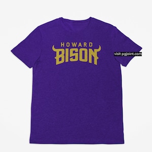 May include: Purple t-shirt with a gold graphic of a bull's head and the text "HOWARD BISON".
