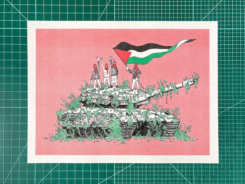 May include: Illustration of a tank covered in green foliage with figures on top holding a flag. The flag is black, white, green, and red. The background is a solid pink color.