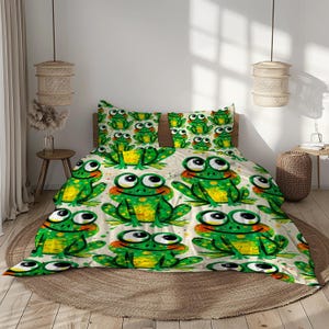 May include: Bedding set featuring a whimsical frog pattern. The design includes large, cartoon-style frogs in shades of green, yellow, and orange against a cream-colored background. The set includes a duvet cover and pillowcases, creating a playful and vibrant bedroom aesthetic.