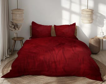 Juego de cama rojo liso con funda nórdica y fundas de almohada en tonos carmesí, burdeos, granate y rubí.