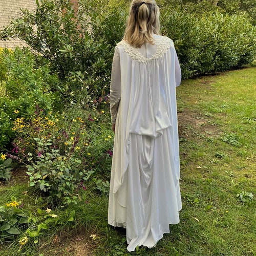 vintage 1970s wedding dresses Butterfly Gown It includes a lace veil that can also be used as a shawl 1970s-Inspired Vintage Wedding Dresses