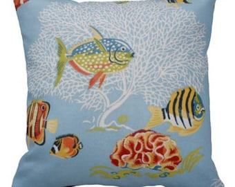 Colorful fish and coral on blue background pillow.