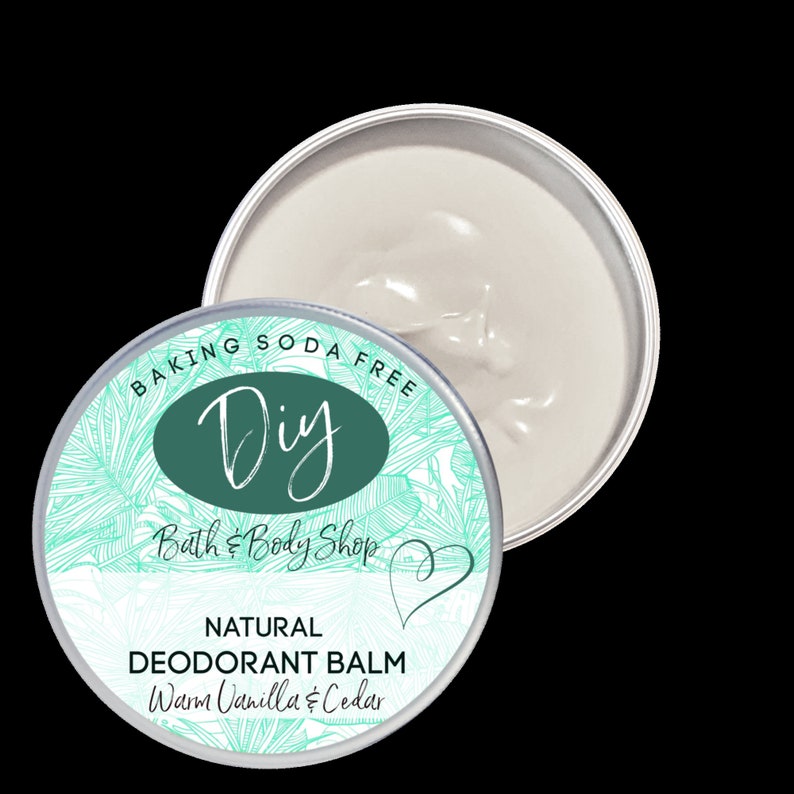 May include: A silver tin with a green and white label that reads "BAKING SODA FREE Diy Bath & Body Shop" and "NATURAL DEODORANT BALM Warm Vanilla & Cedar".