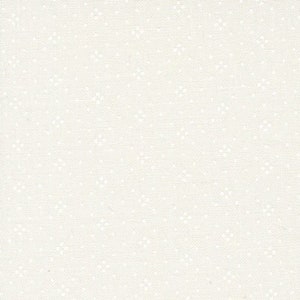 May include: White fabric with a subtle, evenly distributed pattern of tiny white dots. The fabric is measured with a ruler that has the word "moda" printed on it.
