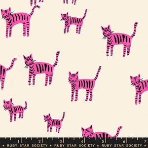 May include: Cream-coloured fabric with a repeating pattern of pink cats with black stripes. The cats are in various poses. The text "RUBY STAR SOCIETY" is at the bottom. The pattern is suitable for various craft projects.