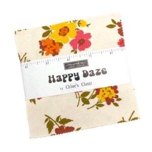 May include: A bundle of fabric squares featuring a floral design in yellow, orange, and pink on an off-white backdrop. The squares are wrapped with a white band that reads "Happy Daze" by Chloe's Closet.