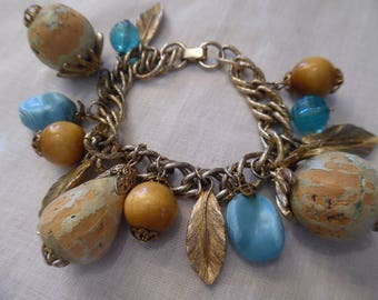 Vintage 1960s Goldtone Chain Link Bracelet with Cork Wood and Plastic Bead and Leaf Shaped Charms
