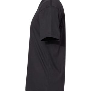 May include: A solid black short-sleeve t-shirt. The shirt has a crew neck and a relaxed fit. The fabric appears to be a soft, lightweight material. The image shows a side view of the shirt.