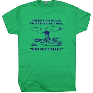 May include: Green t-shirt with a blue graphic that says "There's no place I'd rather be than... "Beaver Valley". The graphic also includes a drawing of a valley with a small town.