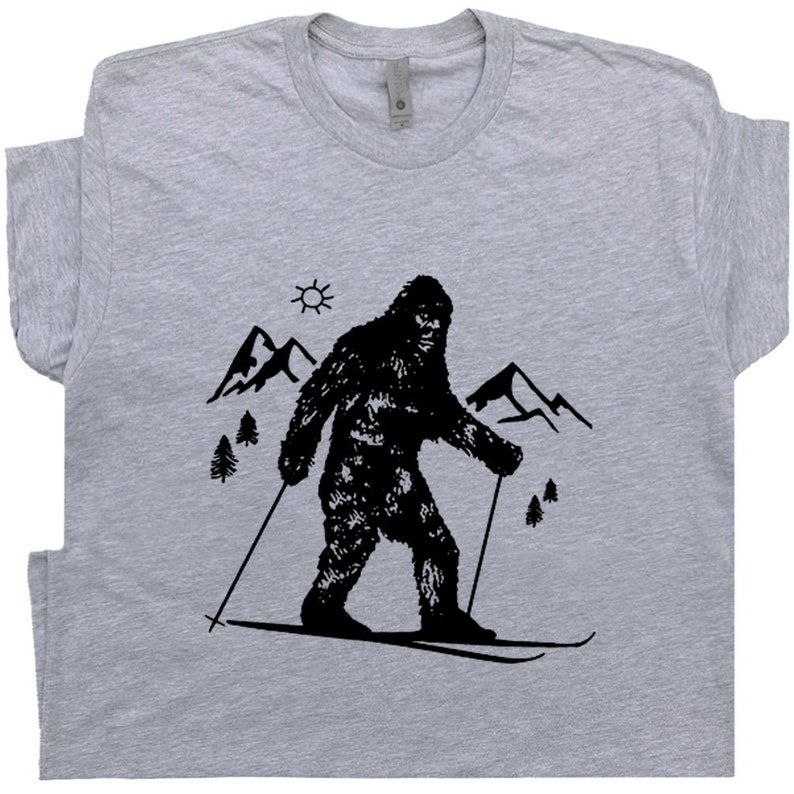 Bigfoot Skiing T Shirt Funny Skier T Shirt Cool Snow Skiing Tee Hilarious Yeti Vintage Graphic Tee Sasquatch Tshirt Mens Womens Kids Teen 
