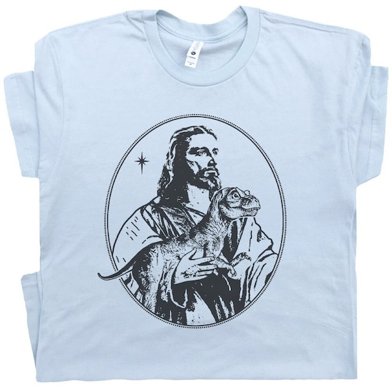 Jesus Holding Dinosaur T Shirt Funny Shirts for Men Women Offensive T Shirts Weird Unusual Raptor Cool Christian Shirts Graphic Tee T-Rex