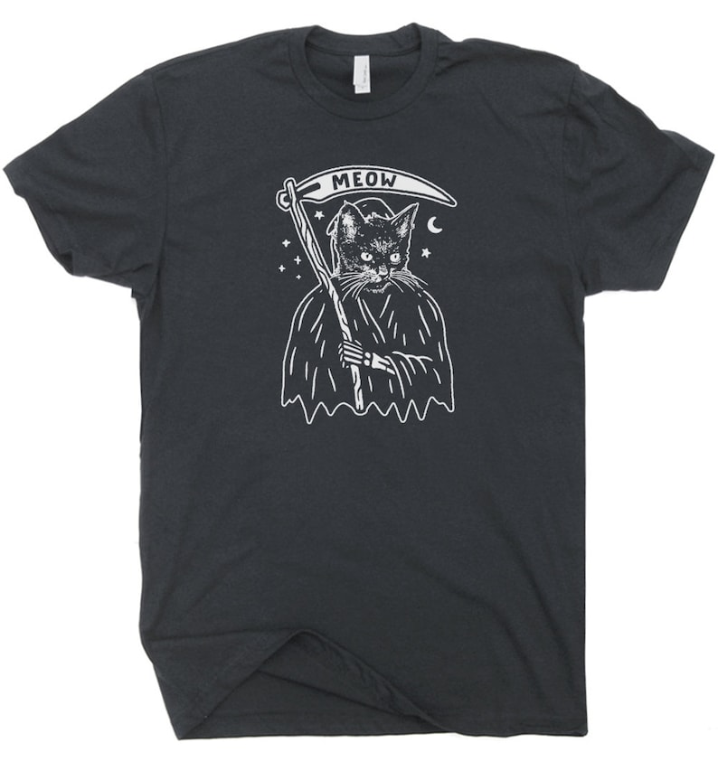 May include: Black t-shirt with a white graphic of a cat dressed as the Grim Reaper holding a scythe. The graphic says "MEOW" above the cat.