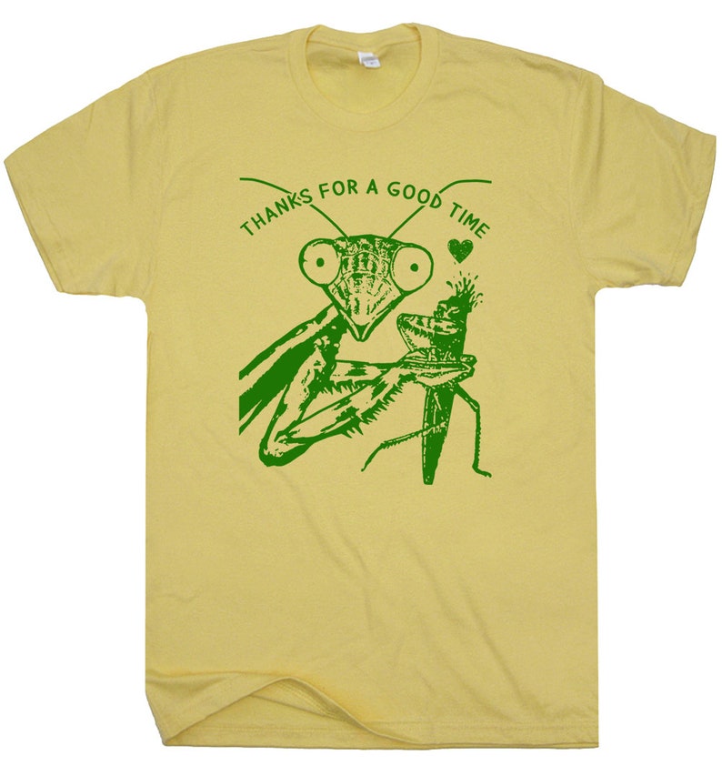 May include: A yellow t-shirt with a green print of a praying mantis holding a smaller insect. The text "THANKS FOR A GOOD TIME" is printed above the mantis.