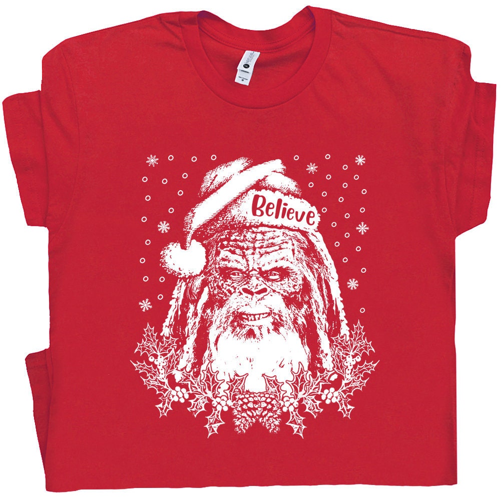 Bigfoot Santa Claus T Shirt Funny Christmas Shirts Christmas Vacation Shirt For Men Women Sasquatch Wearing Santa Hat Tee Yeti Cousin Eddie