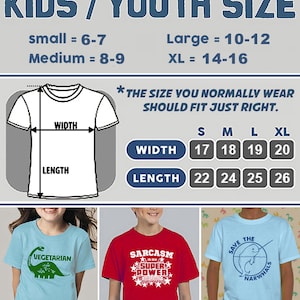 May include: Image showing a kids' t-shirt size chart with measurements in inches. The chart includes width and length dimensions for sizes S, M, L, and XL. Examples of t-shirts with graphics are also shown, including a dinosaur, text that says "Sarcasm is my Super Power", and a narwhal.