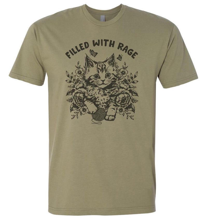 May include: A green t-shirt with a black and white illustration of a cat with the text "Filled with Rage".