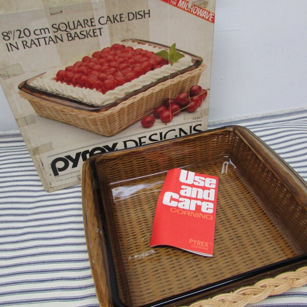 1986 Pyrex 8 Inch Square Cake Dish in Rattan Basket Corning Ovenware. New Old Stock