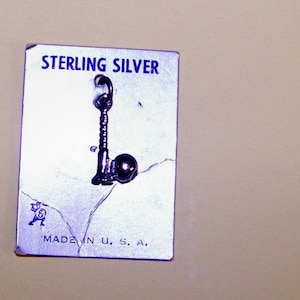 SCREWBALL  CHARM  -- On Original Store Card -- Vintage Sterling