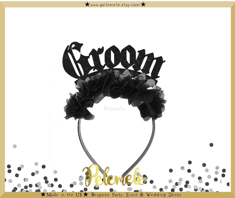 May include: Black headband with a black glitter "Groom" sign and black tulle flowers. The headband is for a wedding or party.