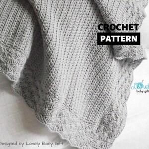 May include: A gray crochet baby blanket with a scalloped edge and a simple stitch pattern. The blanket is designed by Lovely Baby Gift. The text "CROCHET PATTERN" is displayed in black text on a white background.